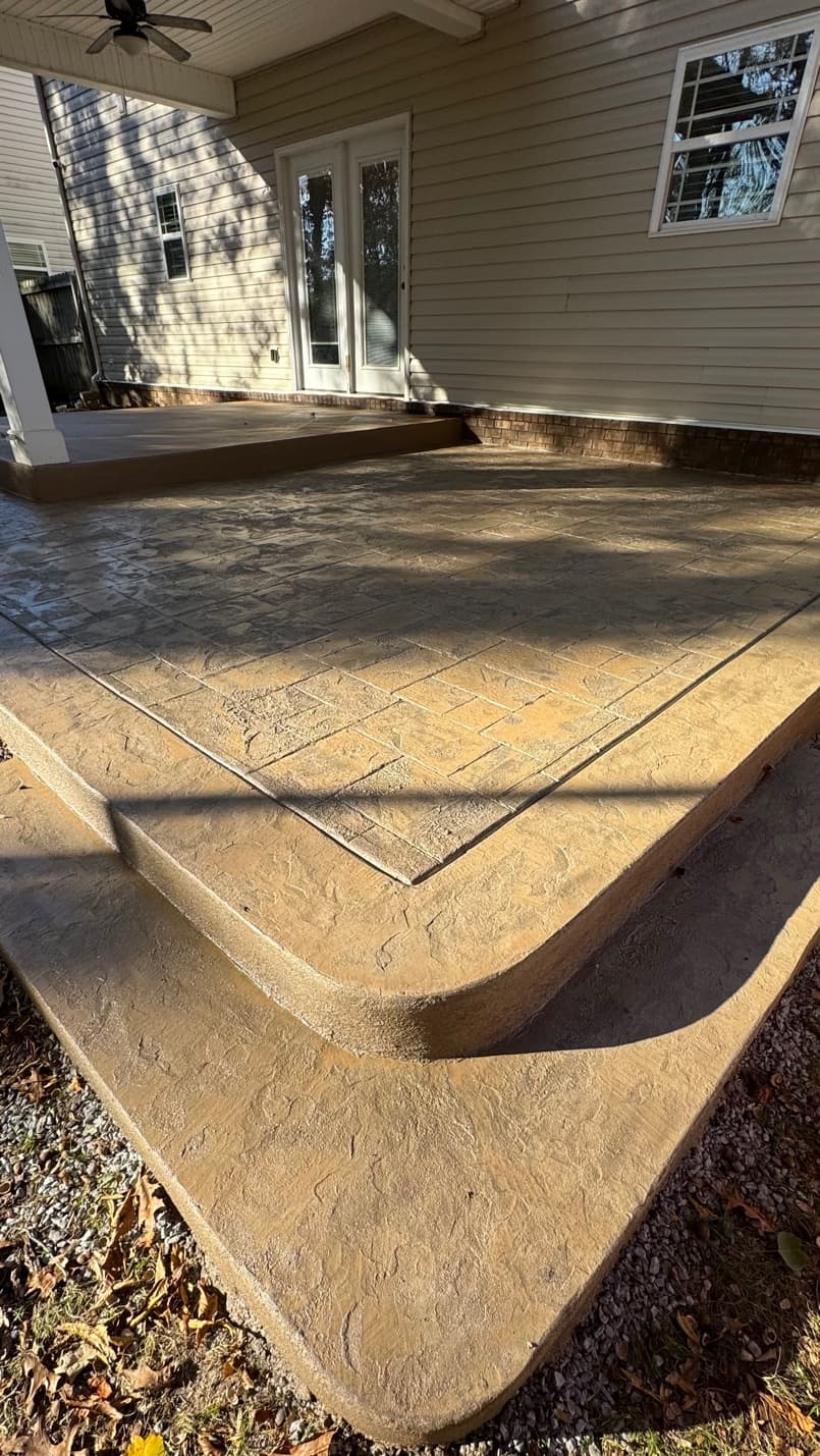 Stamped Concrete Patio — Herringbone Border